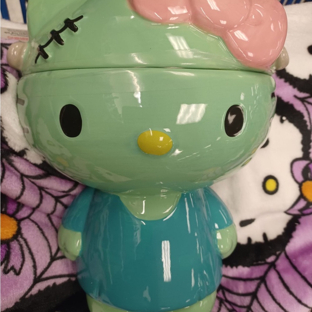 Hello Kitty Mint Green Figurine with Pink Bow and Yellow Nose